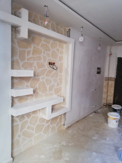 Carrleur+faïence + décoration fausse pierre 