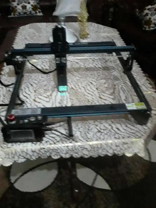 Laser Graveur  et Machine a coudre zigzag  