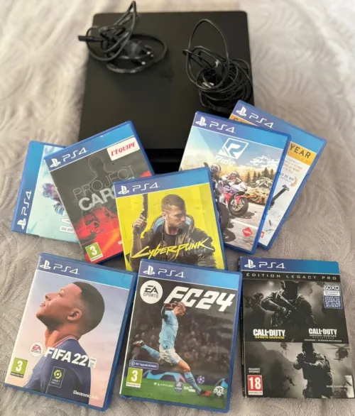 Play station 4 Slim avec 08 CD de jeux sans manette