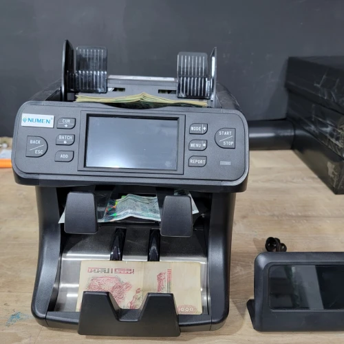 Compteuse des billets et detecteur
