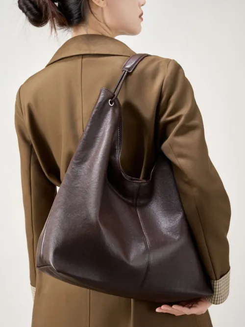 Sac tote en cuir végétal tendance 2026 grande capacité chic polyvalent à porter sur lépaule ou sous le bras pour les cours et le travail