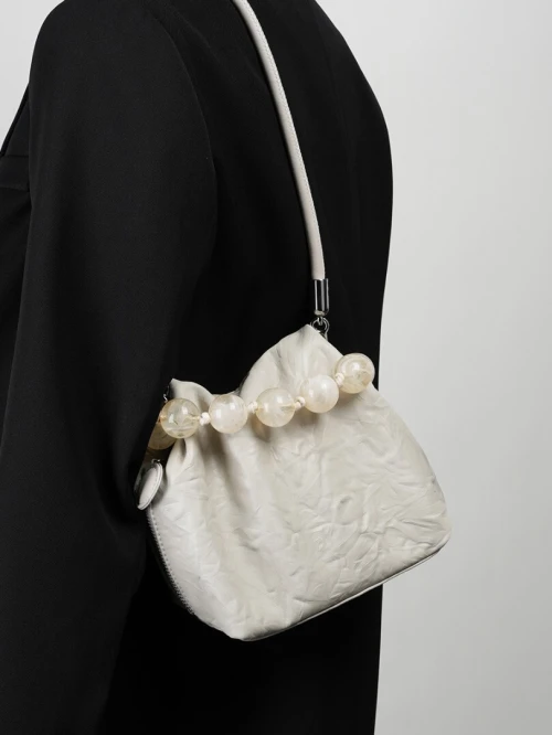 Nouveau style chinois sac à perles original cuir de première couche pour femme motif grainé sac lunch à main et bandoulière