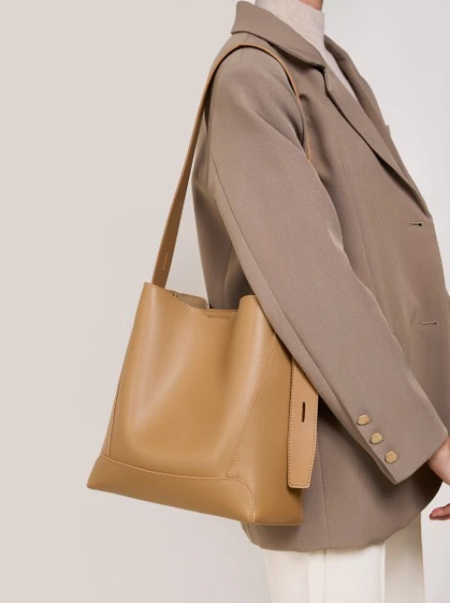Sac seau en cuir véritable pour femme, printemps été 2026, grande capacité, bandoulière polyvalente pour le travail