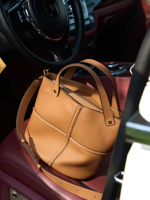 Sac seau cuir de vache pleine fleur style coréen niche nouveau modèle polyvalent grande capacité pour le travail élégant bandoulière