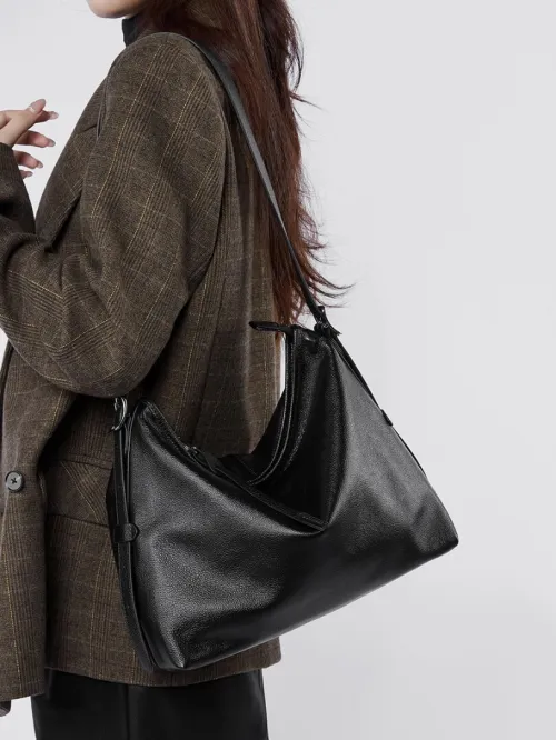 Sac tote grande capacité pratique en cuir véritable chic look de niche à porter sur l épaule ou sous le bras bandoulière tendance