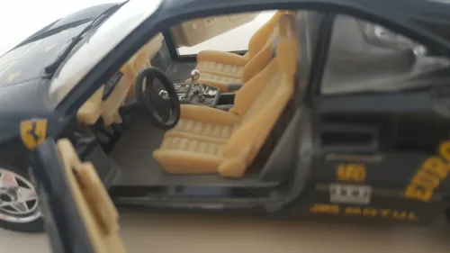 Voiture de course Rally, Ferrari GTO 1984 noir burago 1/24 European University Made in Italy