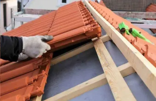  Travaux de charpente et tuile 