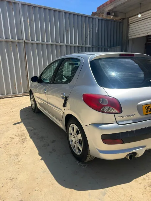 Peugeot 206 Plus 2012 generation