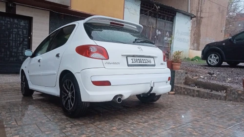 Peugeot 206 Plus 2012 generation