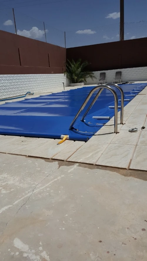 Réalisation couverture piscine bâche a barres
