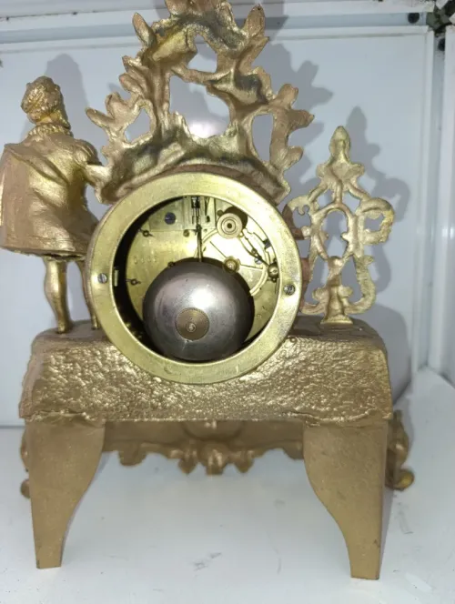 Pendule de cheminée ancienne en régule doré - XIXe siècle