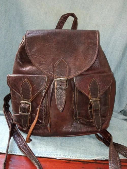 Superbe sac à dos vintage en cuir