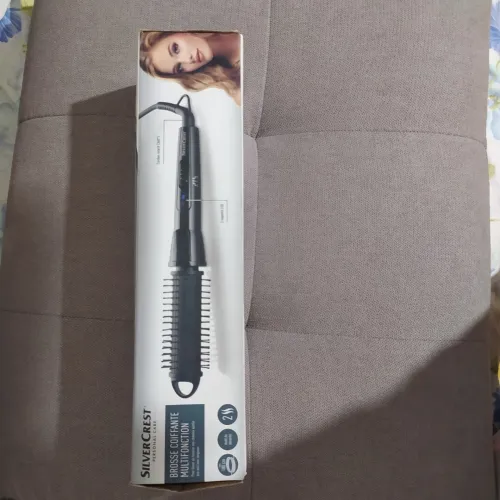 BROSSE COUFFANTE MULTI FONCTION pour lisser ou boucler  vos cheveux  qu'elle que soit leur longues