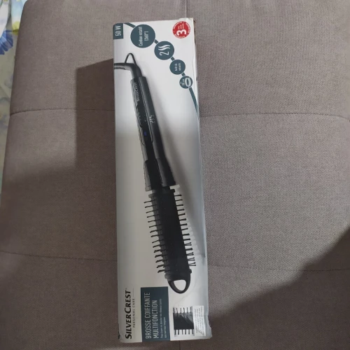 BROSSE COUFFANTE MULTI FONCTION pour lisser ou boucler  vos cheveux  qu'elle que soit leur longues