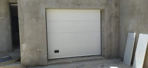 Porte sectionnelle / portail automatique