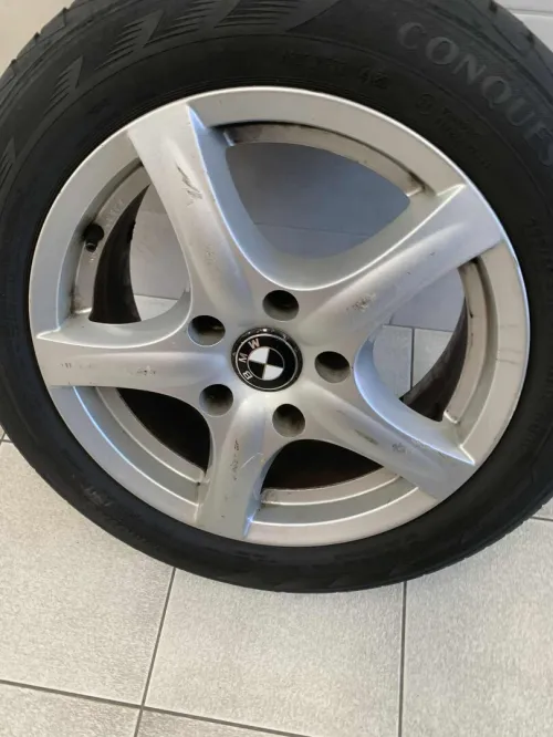 Jand +pnue BMW
