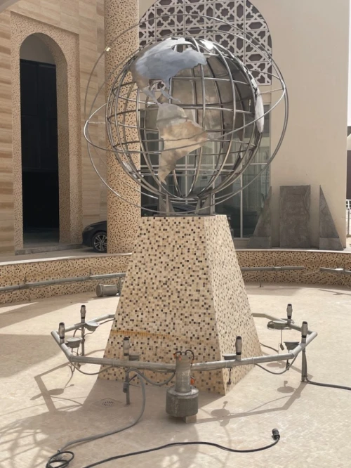 Sculpture - Sphère carte du monde acier inoxydable 