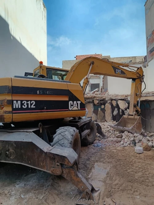 للكراءLocation  Pelle Pneumatique Caterpillar M312