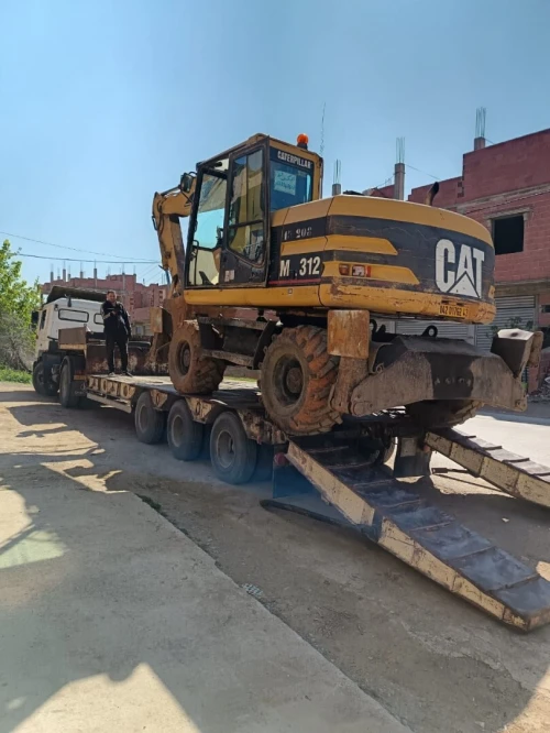 للكراءLocation  Pelle Pneumatique Caterpillar M312