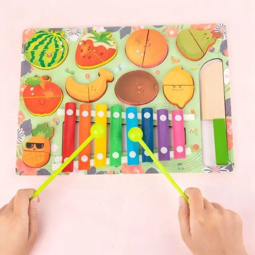Planche à découper des fruits pour enfant avec piano