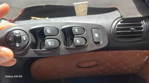bouton lève vitre comodo accent
