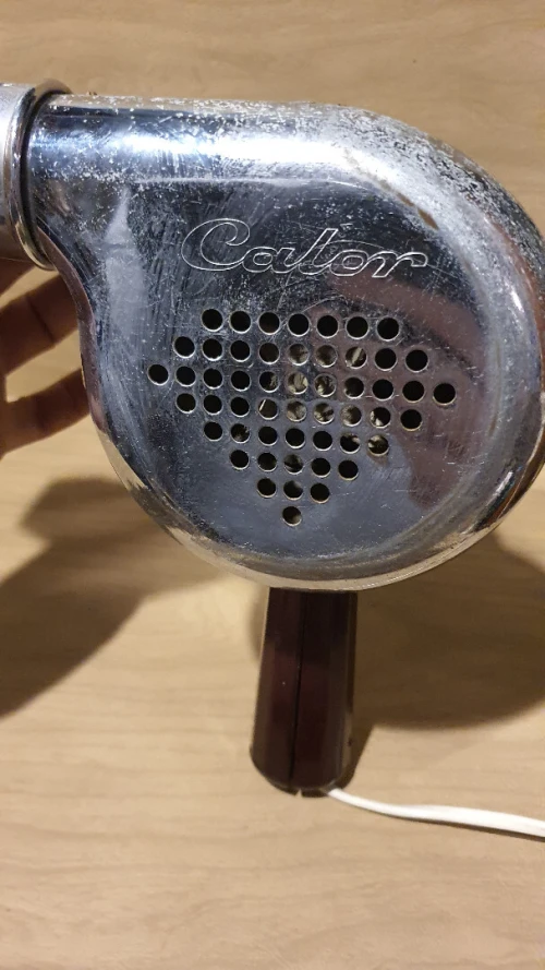 Sèche-cheveux vintage en inox et bakélite de la marque Calor, années 1950.