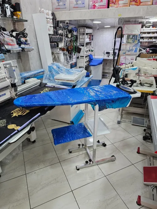 Table de repassage aspirante avec centrale a vapeur intégré طاولة حدادة مع شوديار