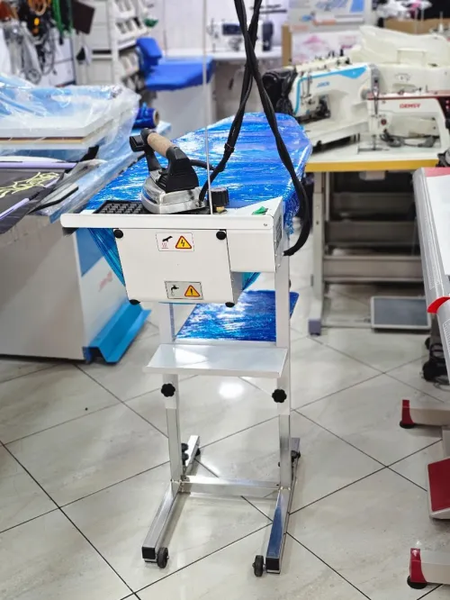 Table de repassage aspirante avec centrale a vapeur intégré طاولة حدادة مع شوديار