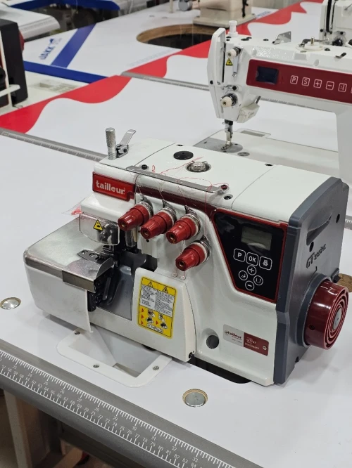 ماكنة سورجي طايور machine a surjeuteuse tailleur 4 file