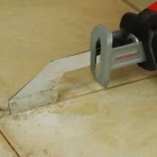 Outil de retrait de joint pour scies sabre