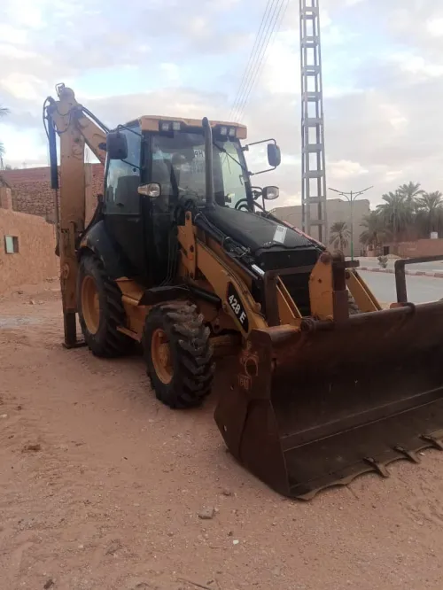 Caterpillar 428E Rétro chargeur Caterpillar 428E 2009