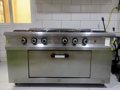 Cuisinière professionnelle+hotte+éléments aluminium 