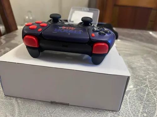 Manette ps5 avec palettes original Sony eta 10/10