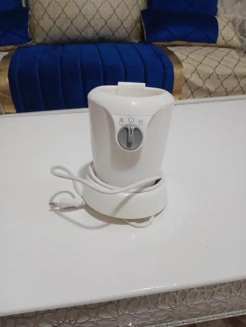 Chauffe biberon Chicco+Tir lait tigex 