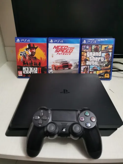 Ps4 slim 500gb avec 3 jeux Rdr +Gta5 +Nfs payback 