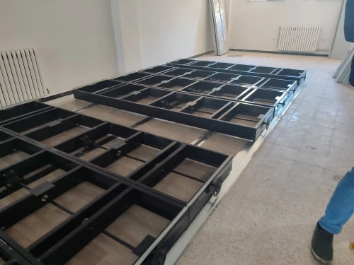 Réalisation et montage sur site Rayonnage Métallique professionnel mobile pour salle d'archive