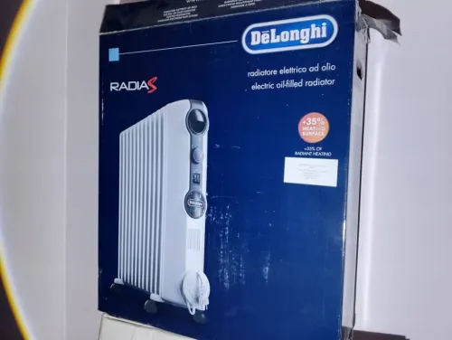 bain d'huile delonghi 2500 w , 10 éléments presque neuf