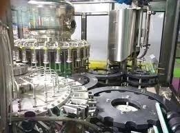 Machine de remplissage d'eaux minérales et boissons gazeuses