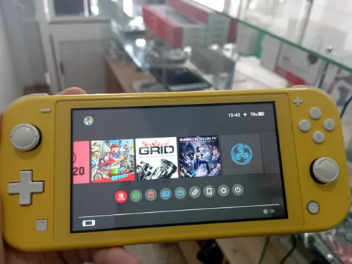 Nintendo Switch Lite flashé 64gb carte memoire
