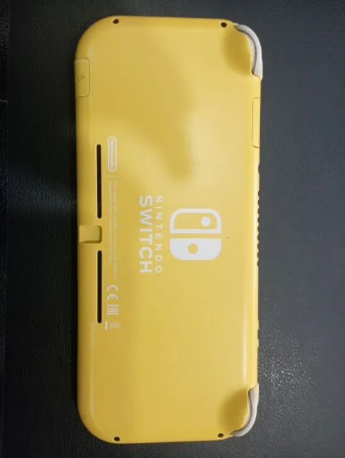 Nintendo Switch Lite flashé 64gb carte memoire