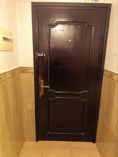 Porte entrée bois rouge