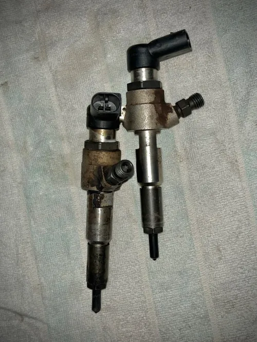 . Injecteur 1.4 tdci Ford 