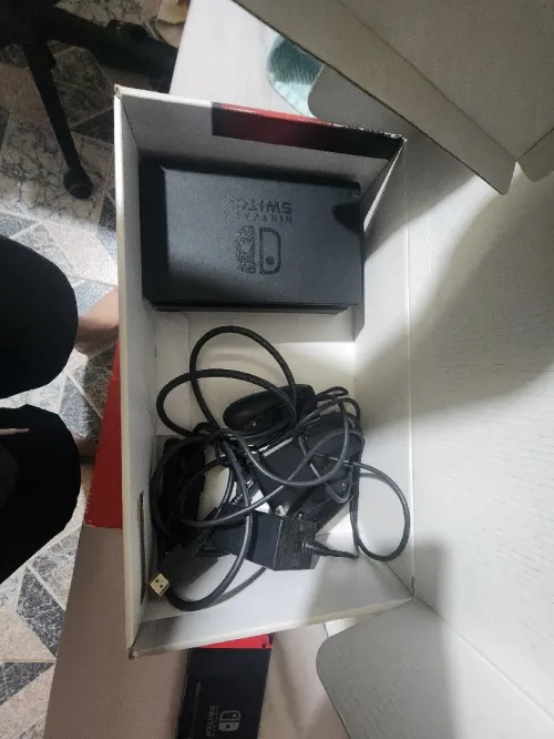 Nintendo switch manette pro +2 joycon +3jeux