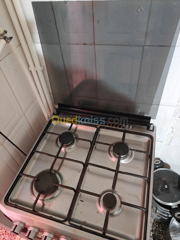 Cuisiniere DIGITECH INOX 60CM très bon état jdida dir 42000da