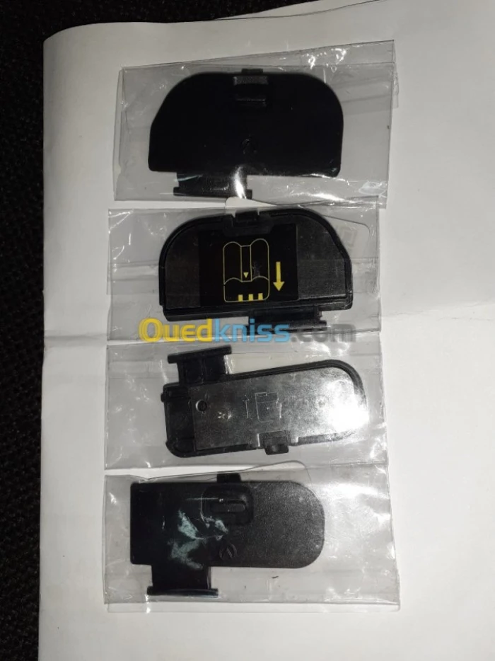 nikon cache batterie