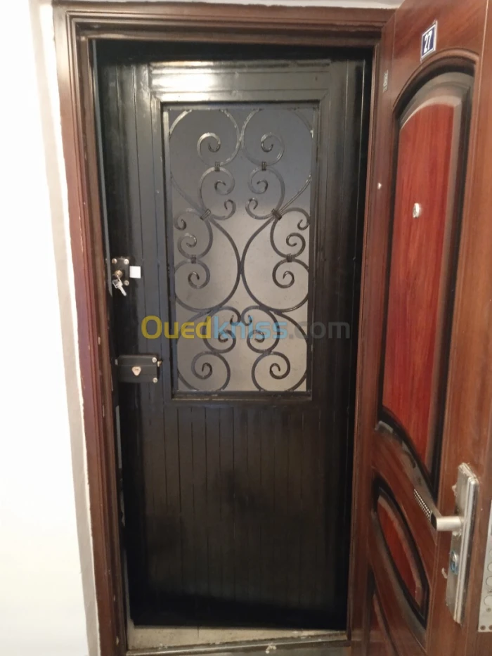 Barroudage et porte en fer forgé 