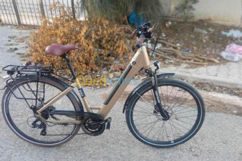  Vélo de Ville Électrique Bicyklet Camille Shimano Acera/Altus 8V 504 Wh 700 mm Beige Ivoire